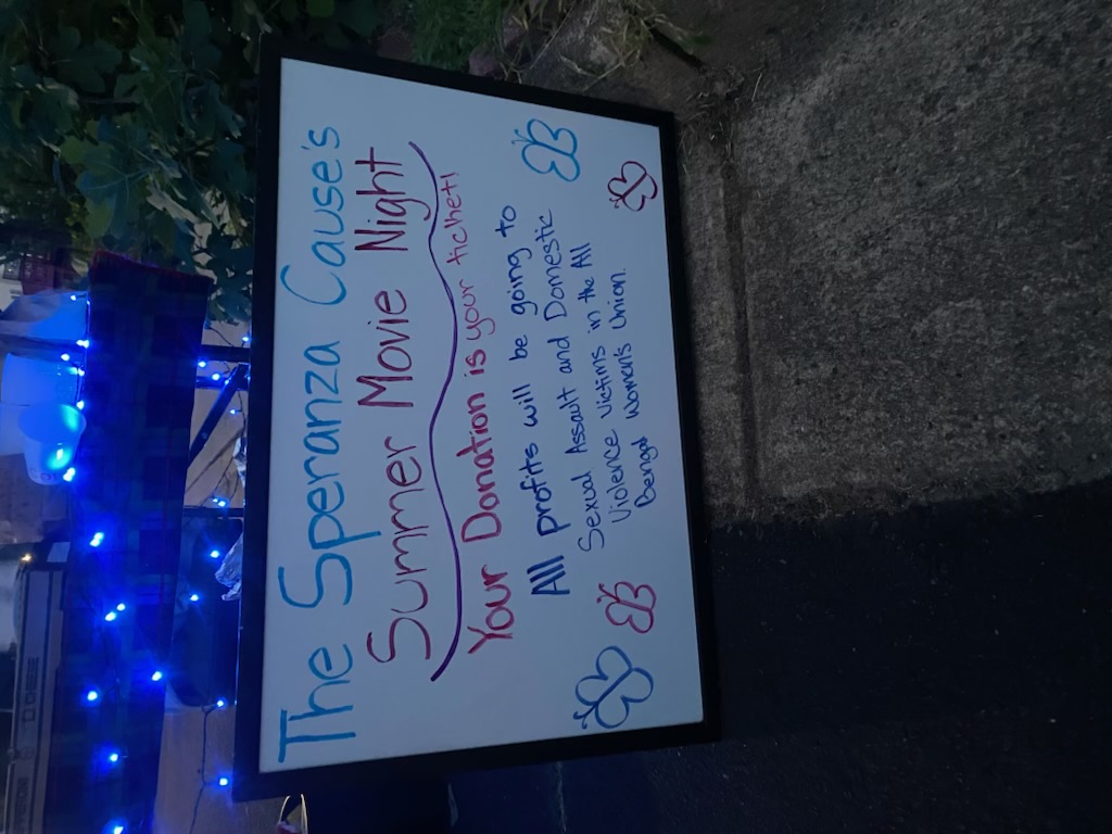 A sign promoting The Speranza Cause summer movie night fundraiser.